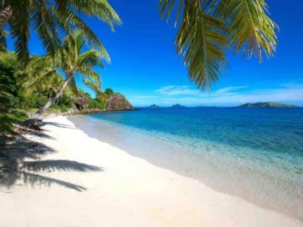 Mana Lagoon Backpackers Villa Buitenkant foto